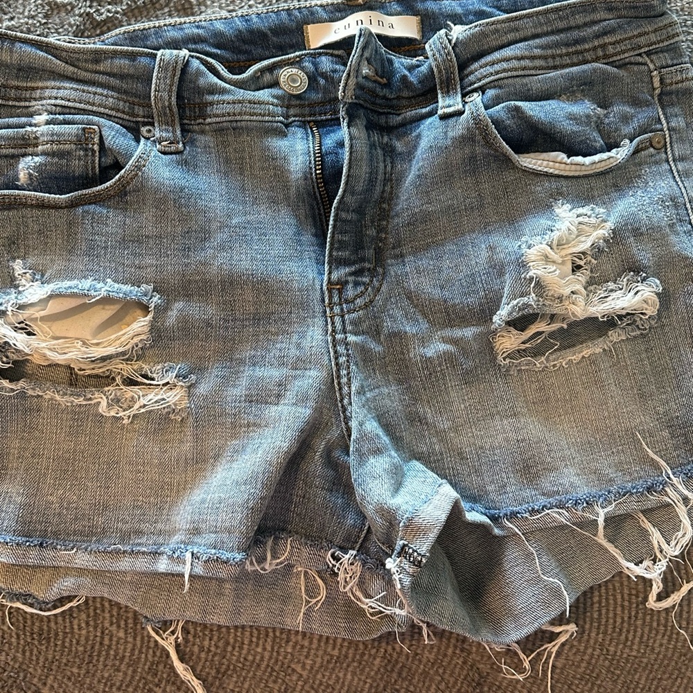 Distressed denim shorts
